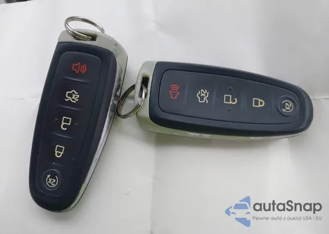 2014 Ford Escape Titanium z USA, uszkodzony, nr VIN 1FMCU9J92EUA53779